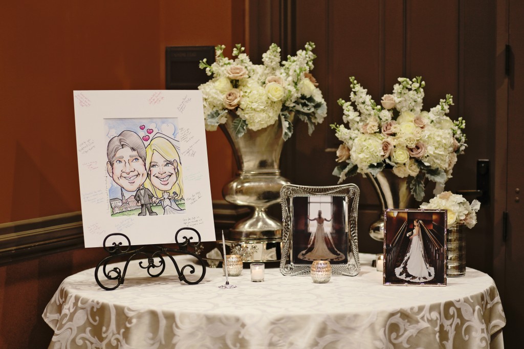 blush roses white hydrangea white stock and dusty miller centerpiece | caricature art guest book | the riley center 