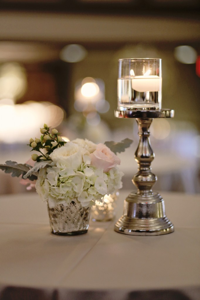 ivory and blush centerpiece in mercury glass