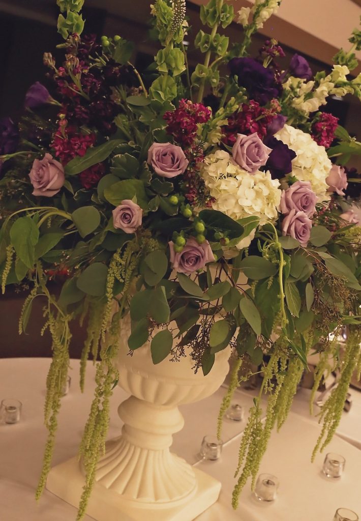 purple urn arrangement by meridian ms florist 