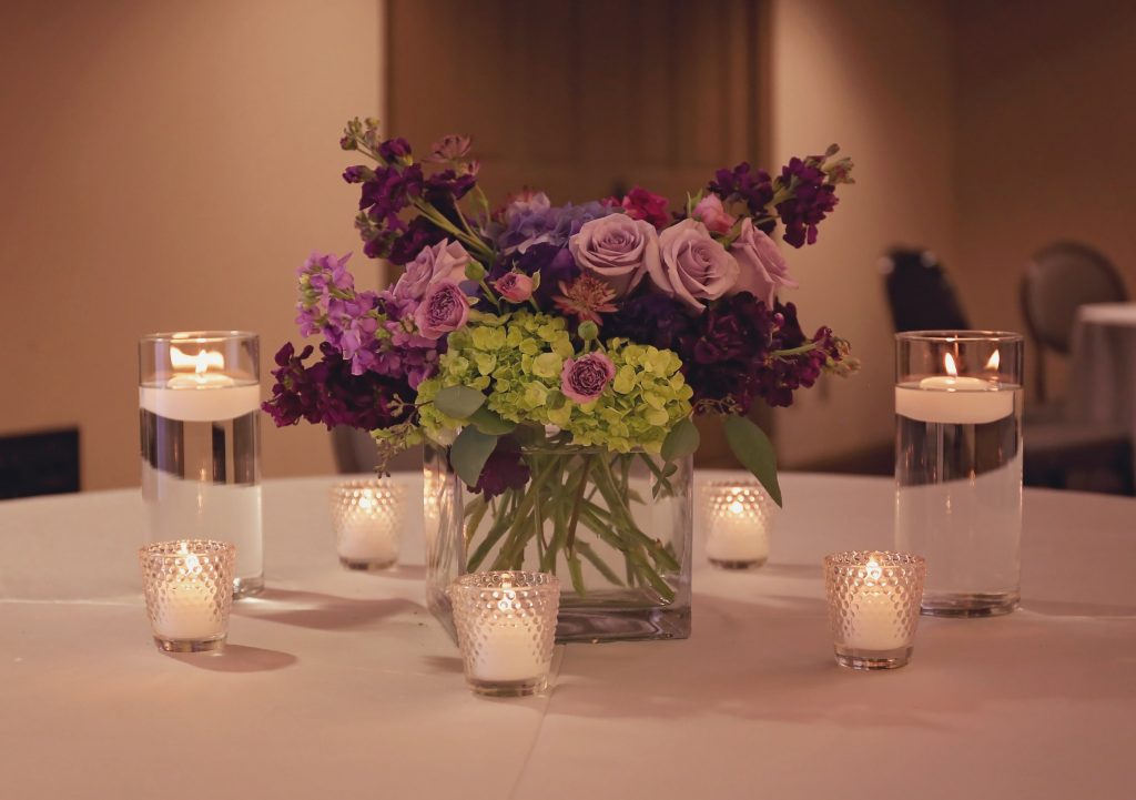 purple centerpiece by meridian ms florist southern productions